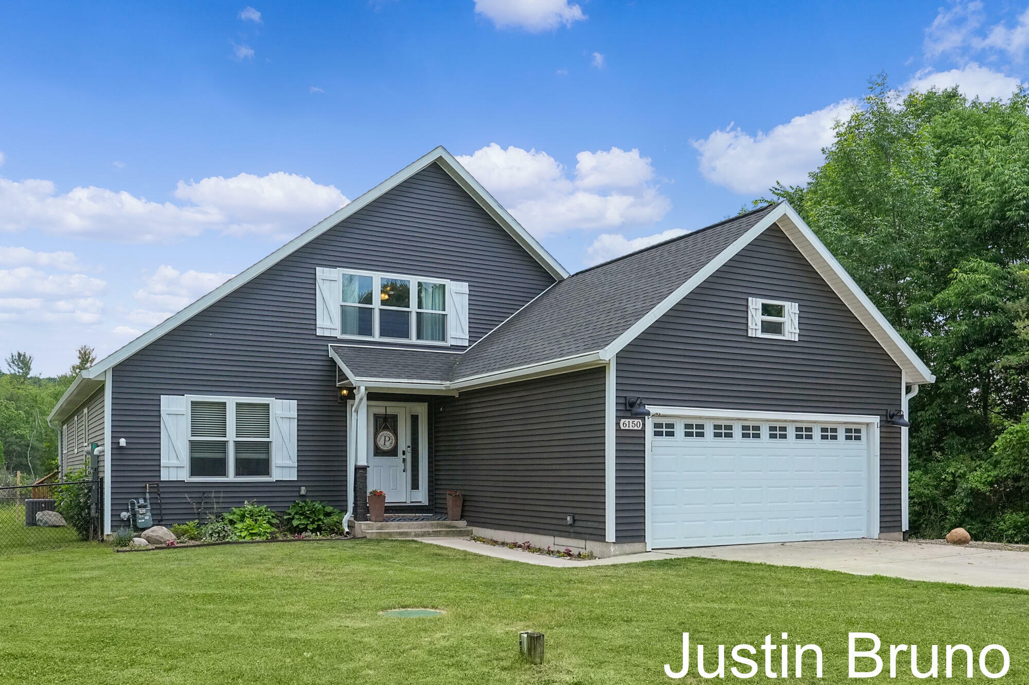 Property Photo: 6150 Cannonsburg Road NE MI 49306