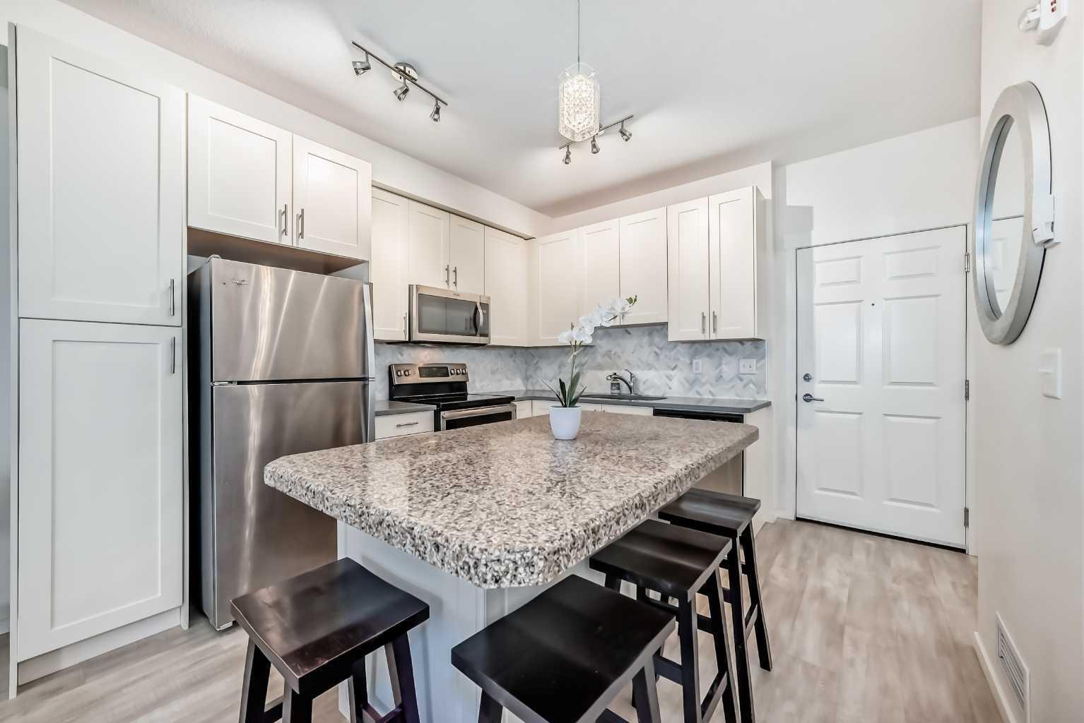 Property Photo: 215 Legacy Boulevard SE 3118 AB T2X 3Z6