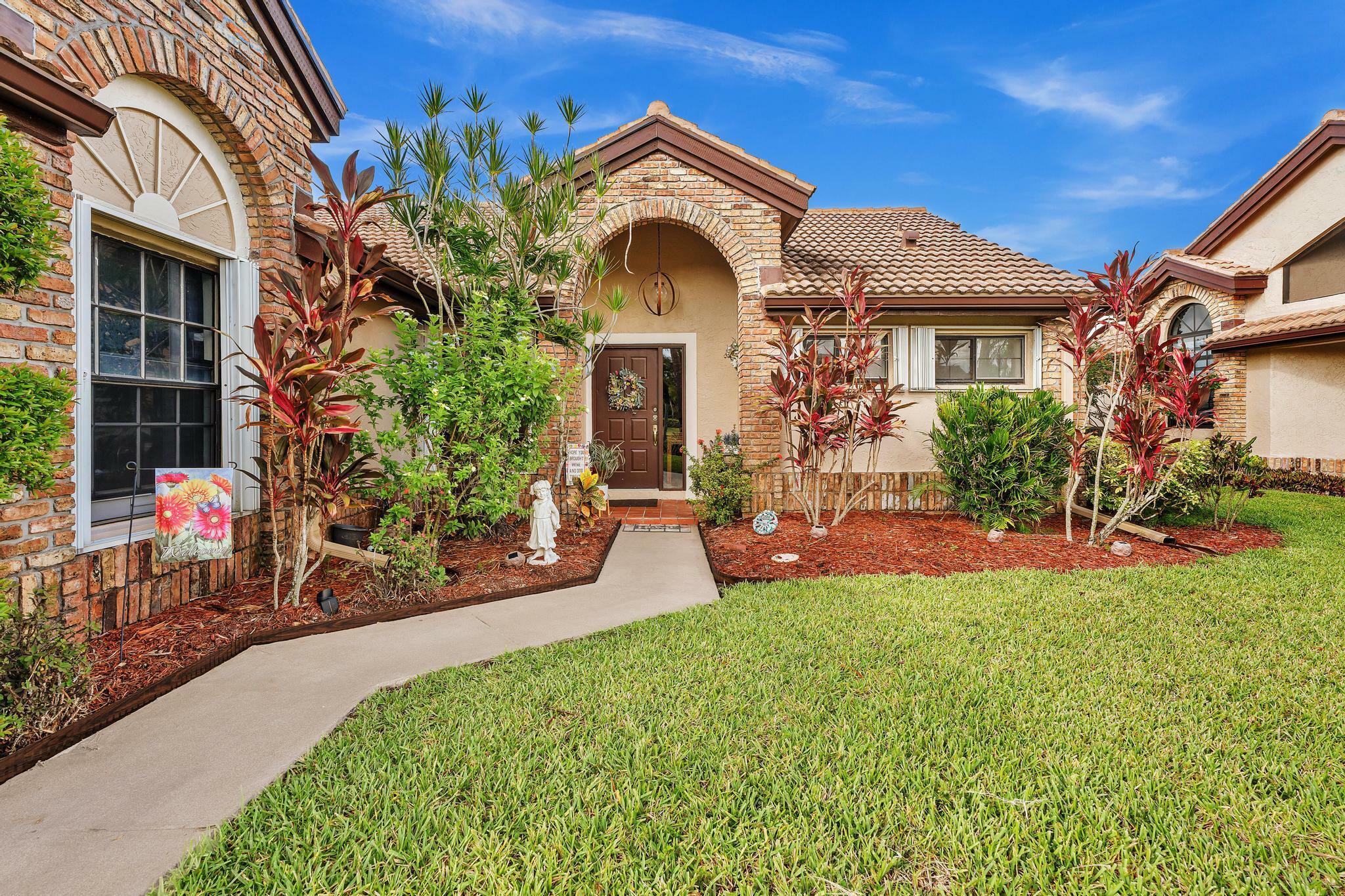 Property Photo: 8099 Cassia Drive FL 33472