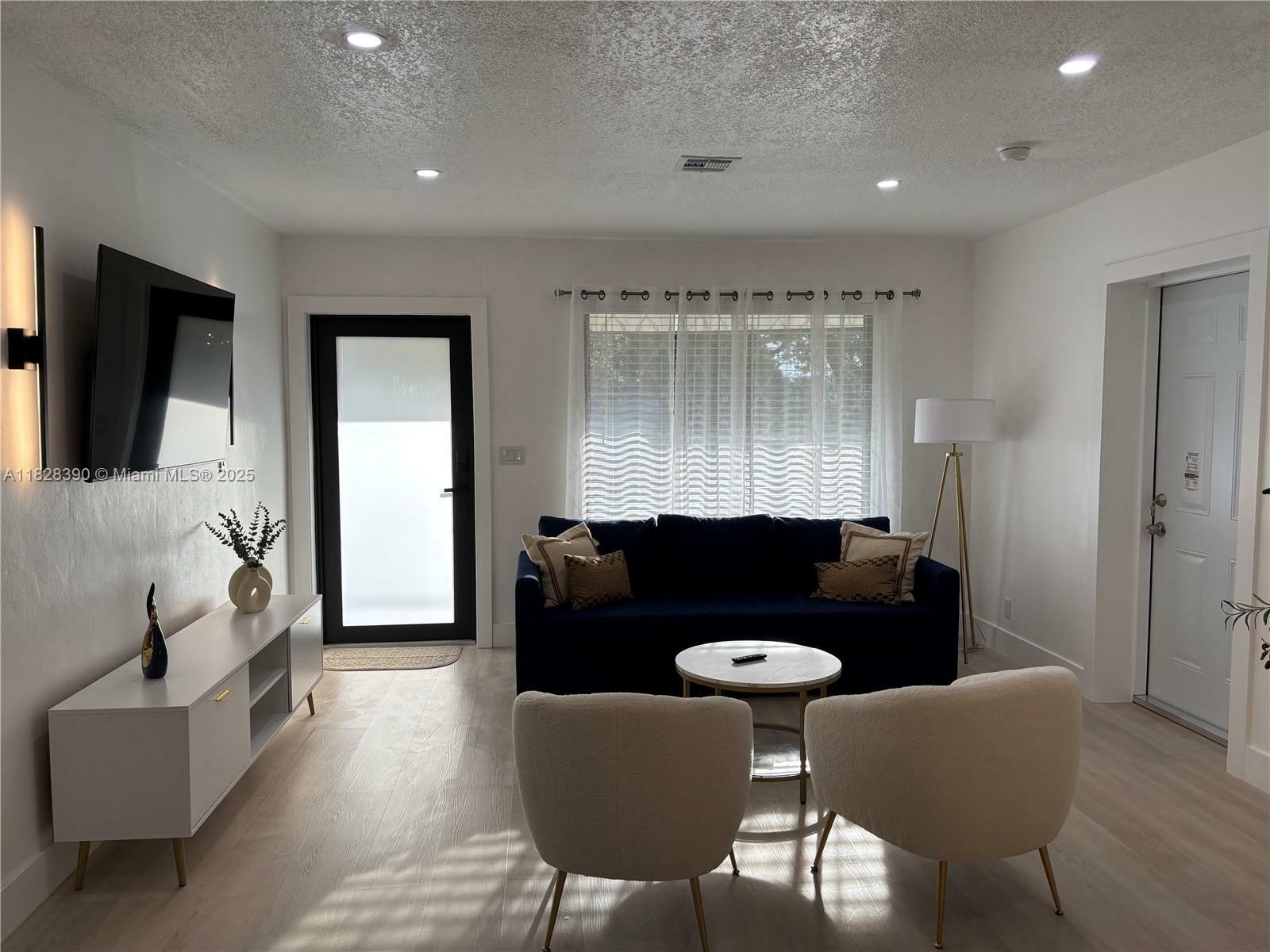 Property Photo: 1023 NW 19th Ave 0 FL 33125