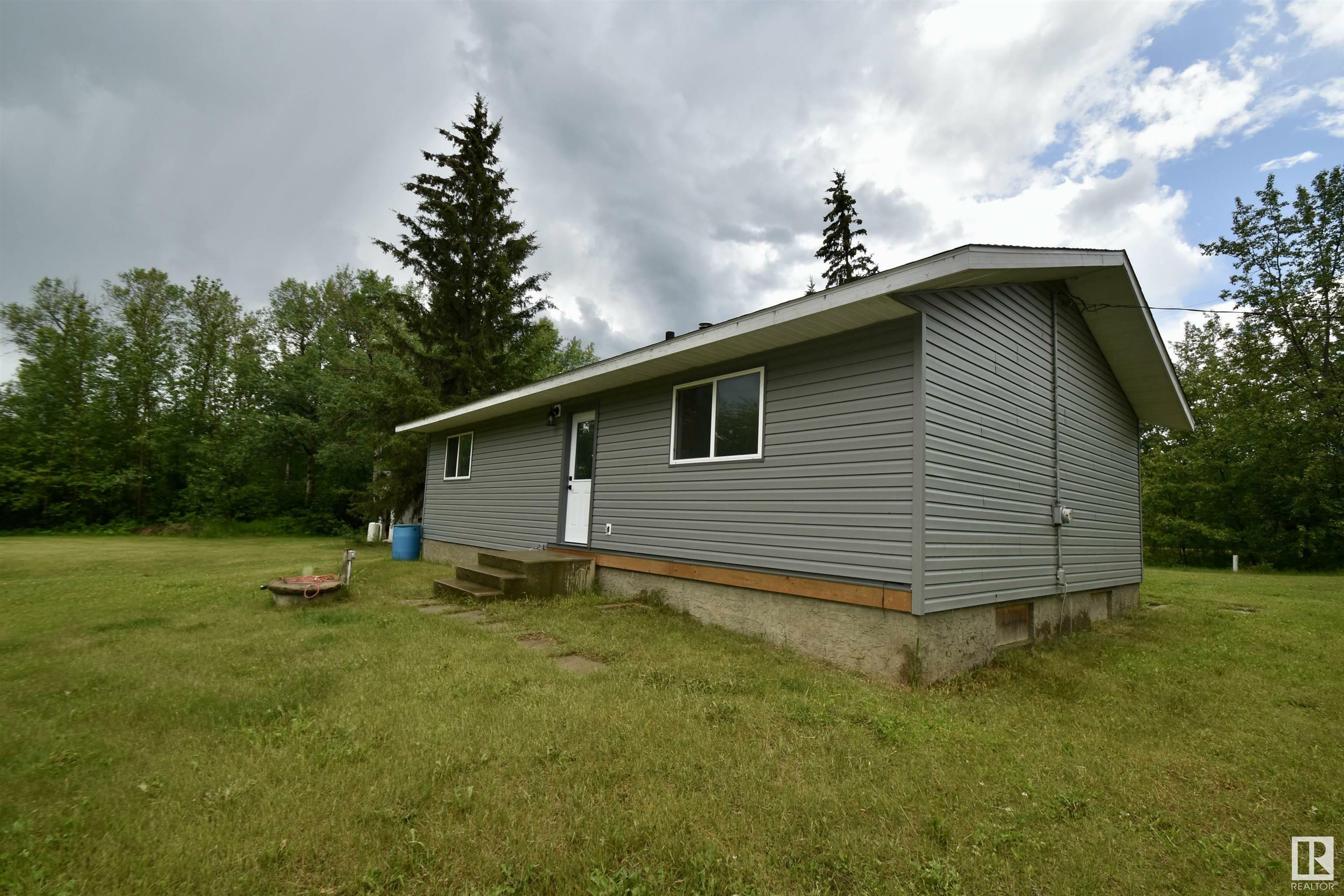 Property Photo: 3 13239 Twp Rd 615 AB T0A 3C0
