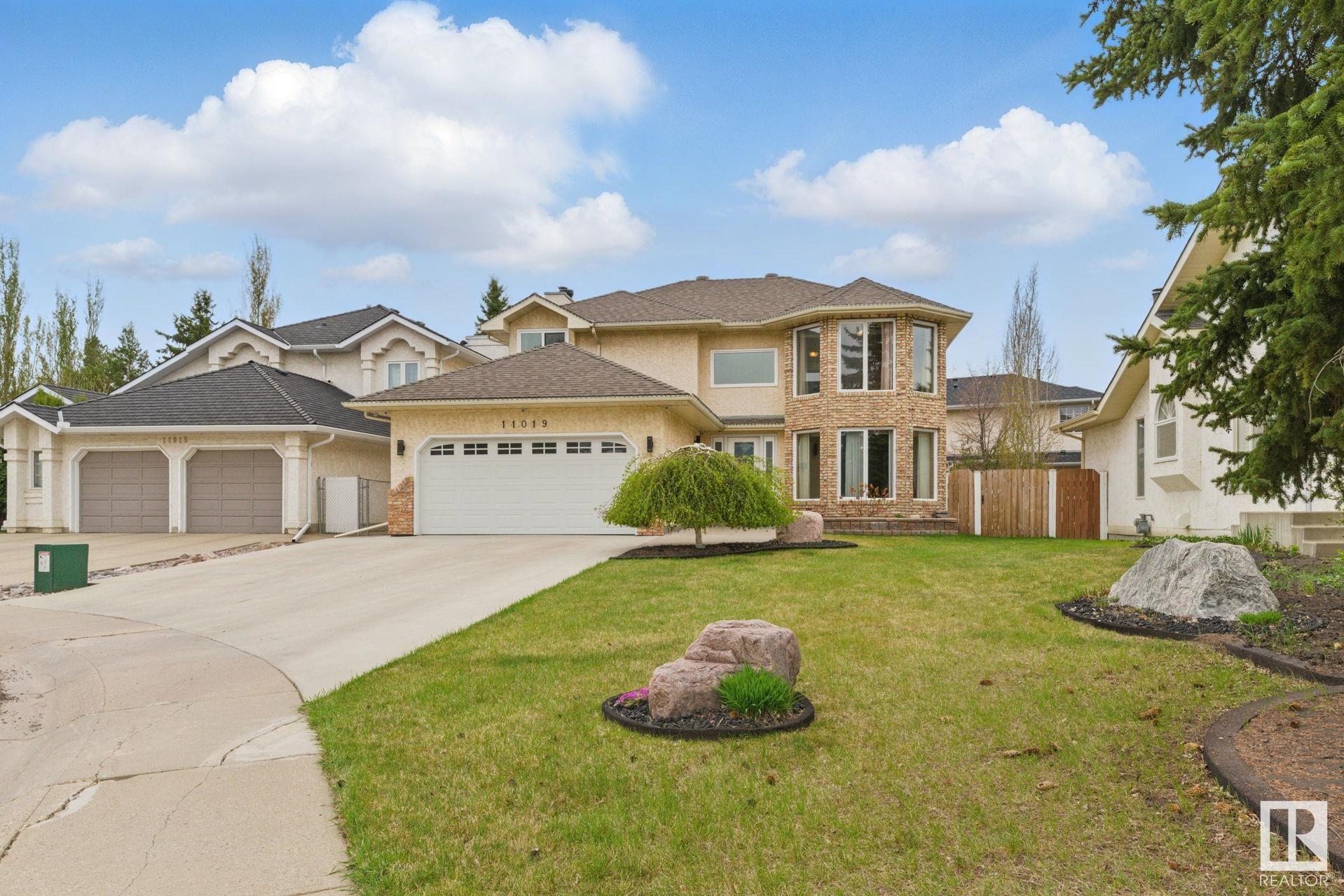 Property Photo: 11019 10 Avenue NW AB T6J 6N4