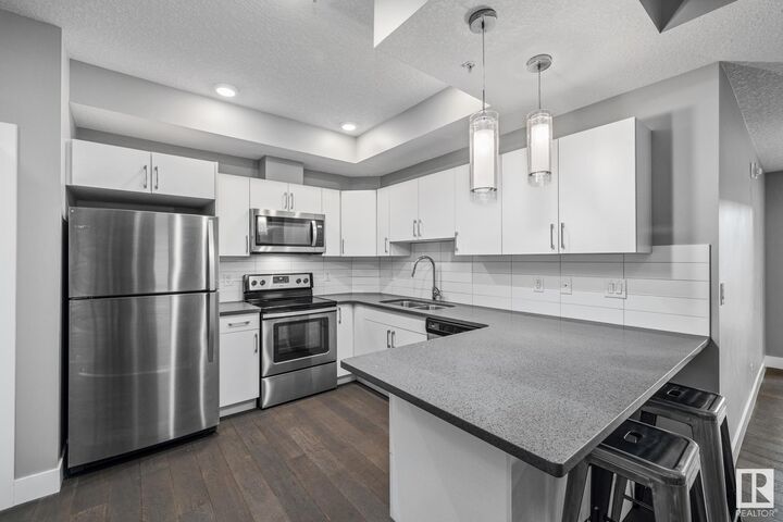 Property Photo: 10006 83 Ave NW 203 AB T6E 2C2