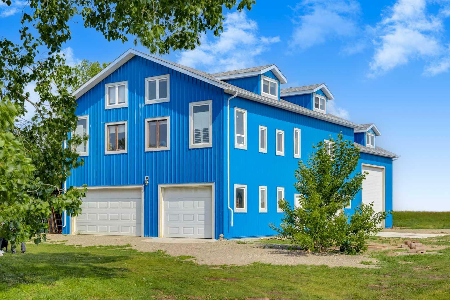 Property Photo: 119016 273 Avenue E AB T1S 4G3