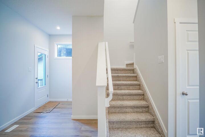 Property Photo: 111 Ficus Way AB T8L 0Z6