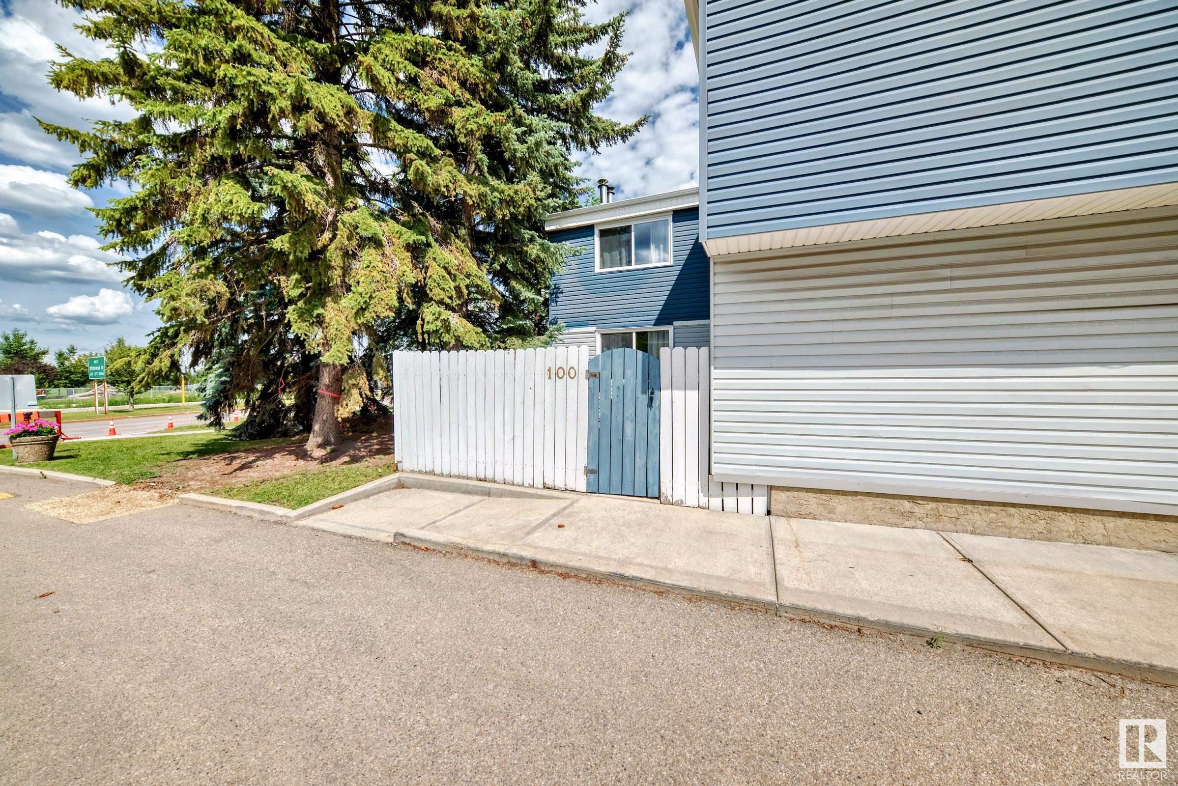 Property Photo: 14707 53 Avenue NW 100 AB T6H 5C9