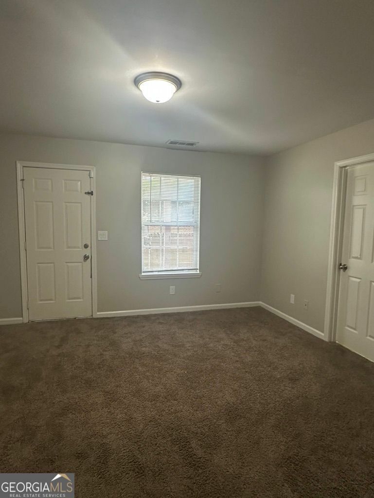 Property Photo: 6898 Slate Stone Way SE 21 GA 30126