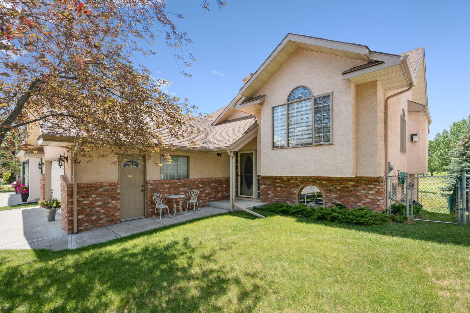 Property Photo: 153 Riverview Circle AB T4C 1K9