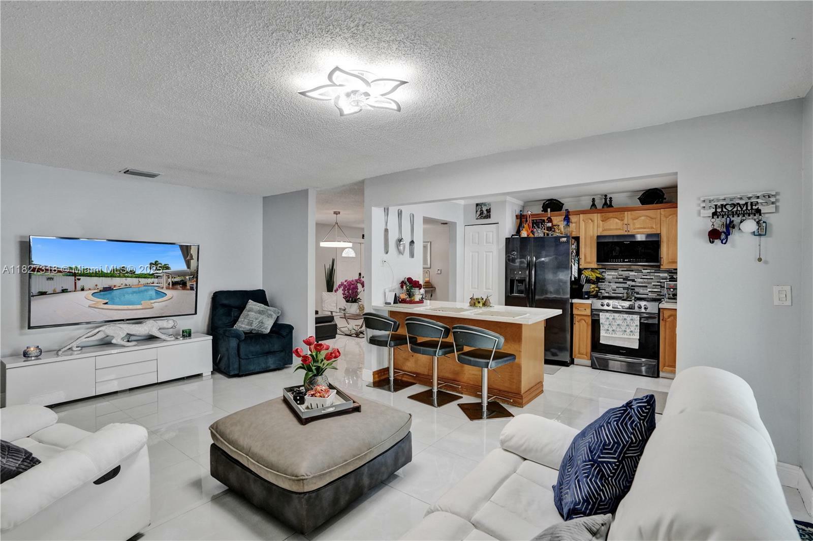 Property Photo: 31 NW 133rd Pl FL 33182