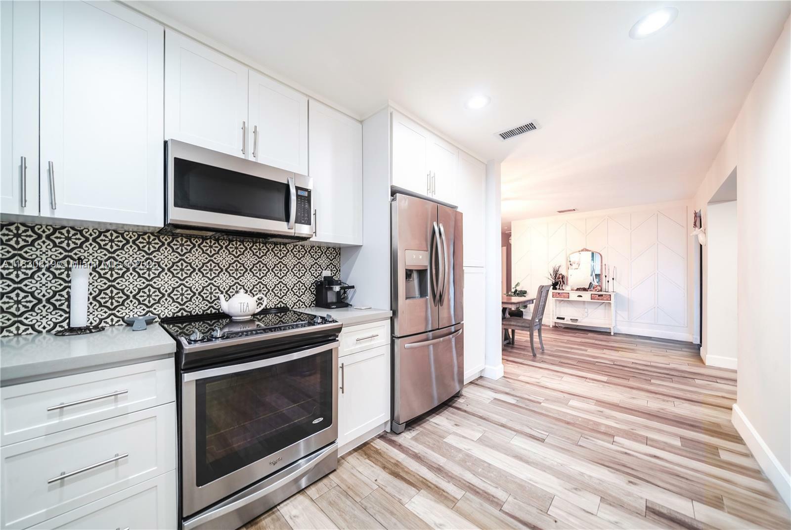 Property Photo: 111 SW 68th Blvd FL 33023