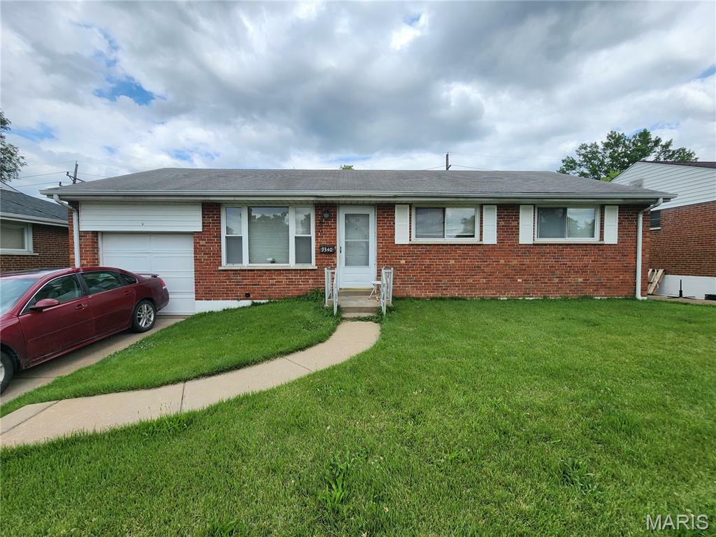 Property Photo:  9340 Bellefontaine Road  MO 63137 