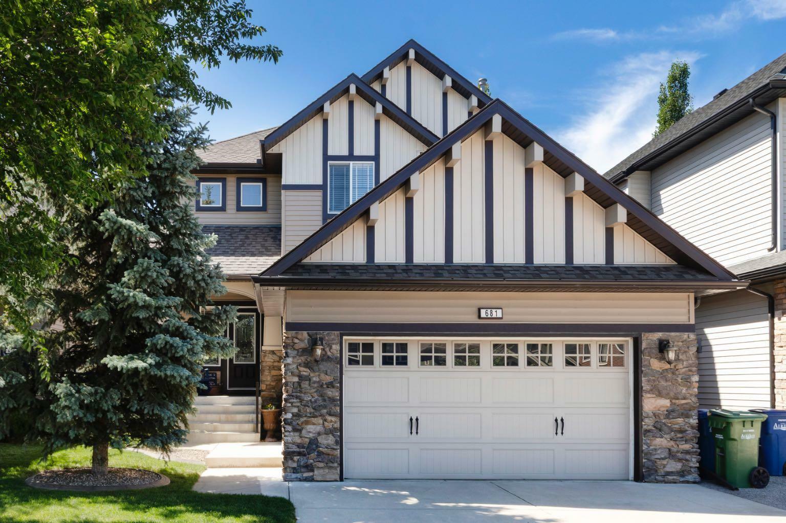 Property Photo: 681 Coopers Drive SW AB T4B 2R9