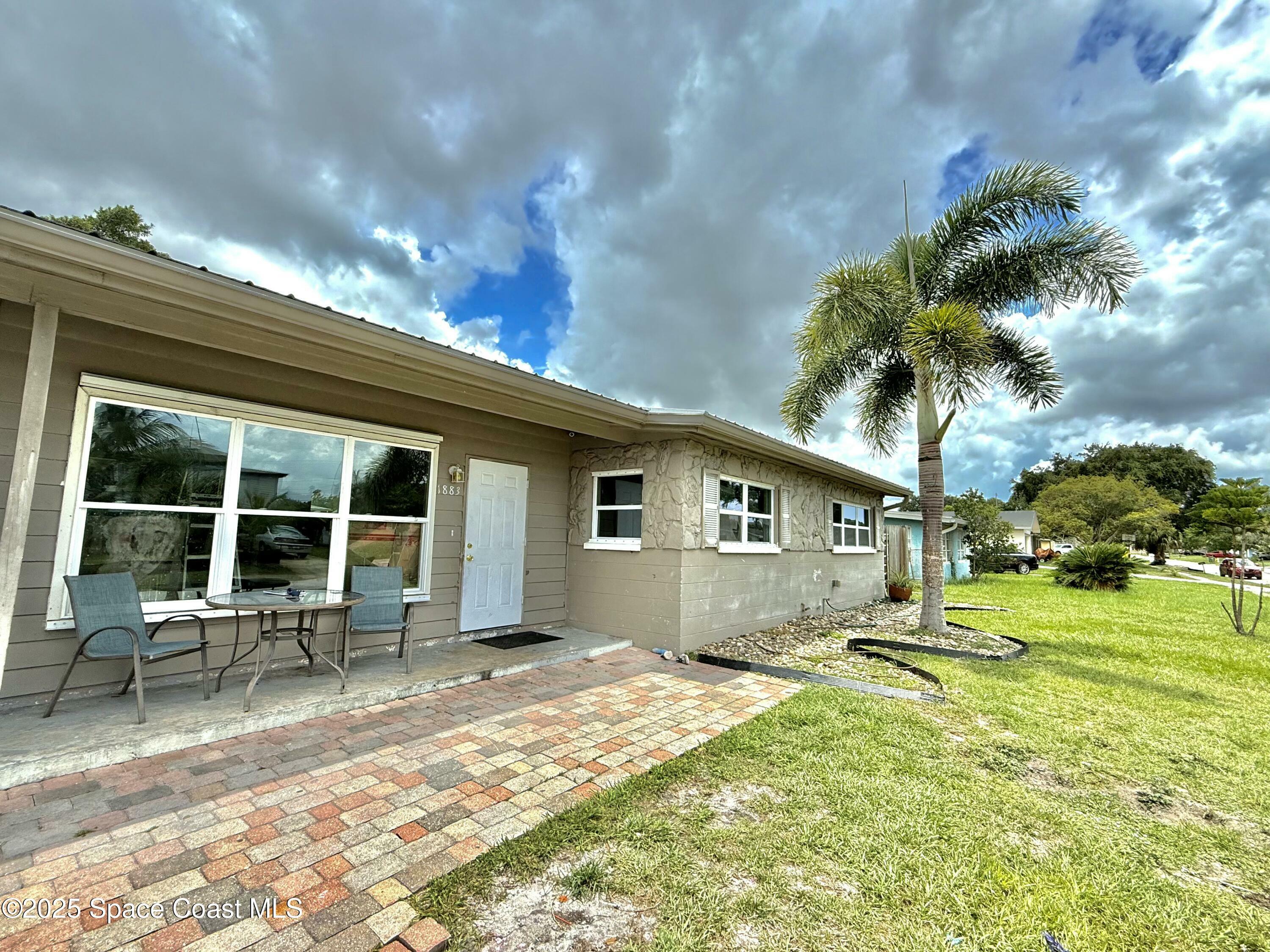 Property Photo: 1883 Coolidge Avenue FL 32935