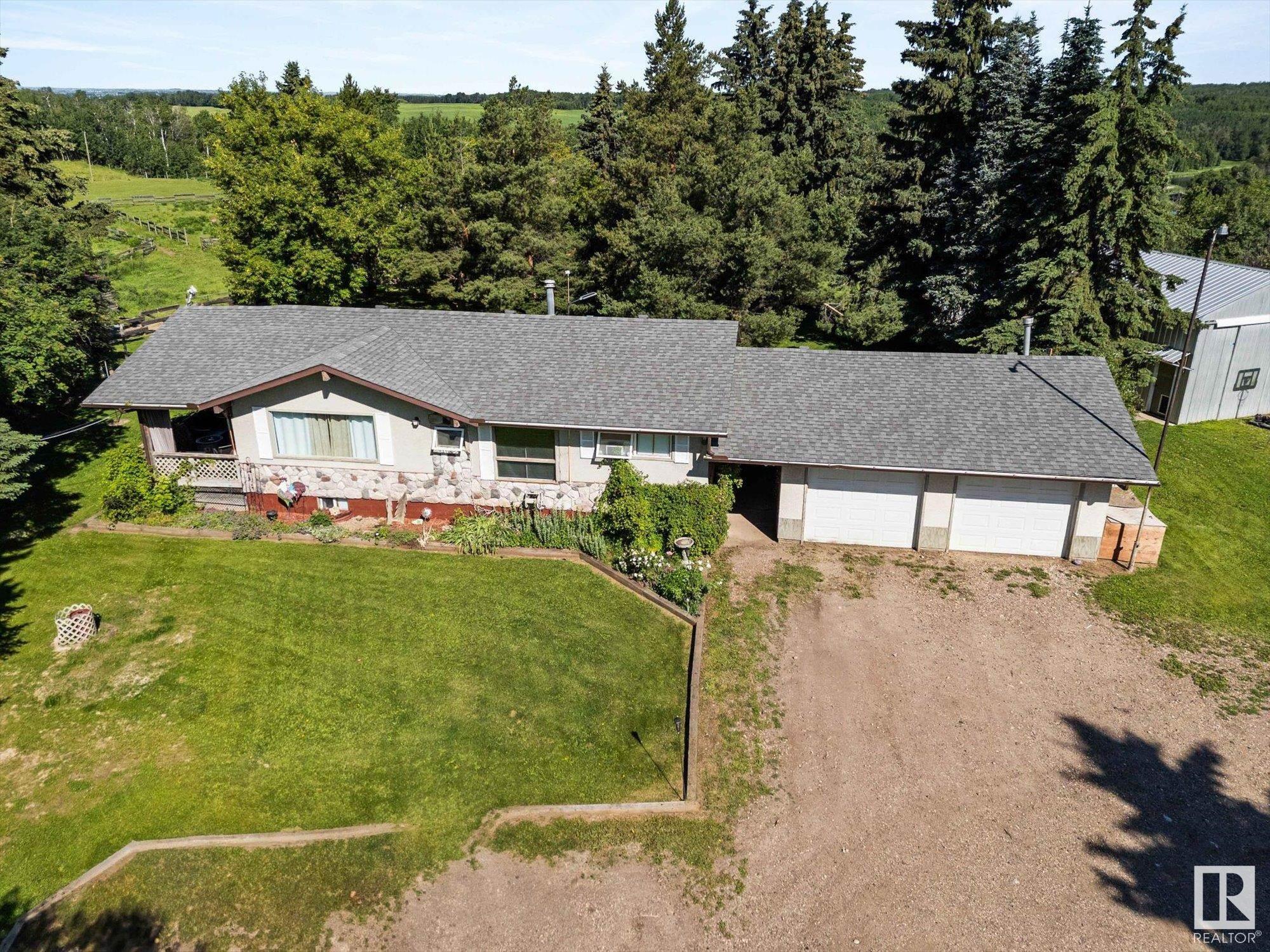 Property Photo: 53508 Rge Road 14 AB T7Y 0B5