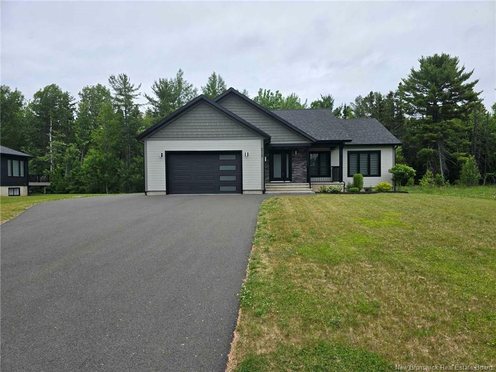 Property Photo: 215 Youghall Drive NB E2A 4X5