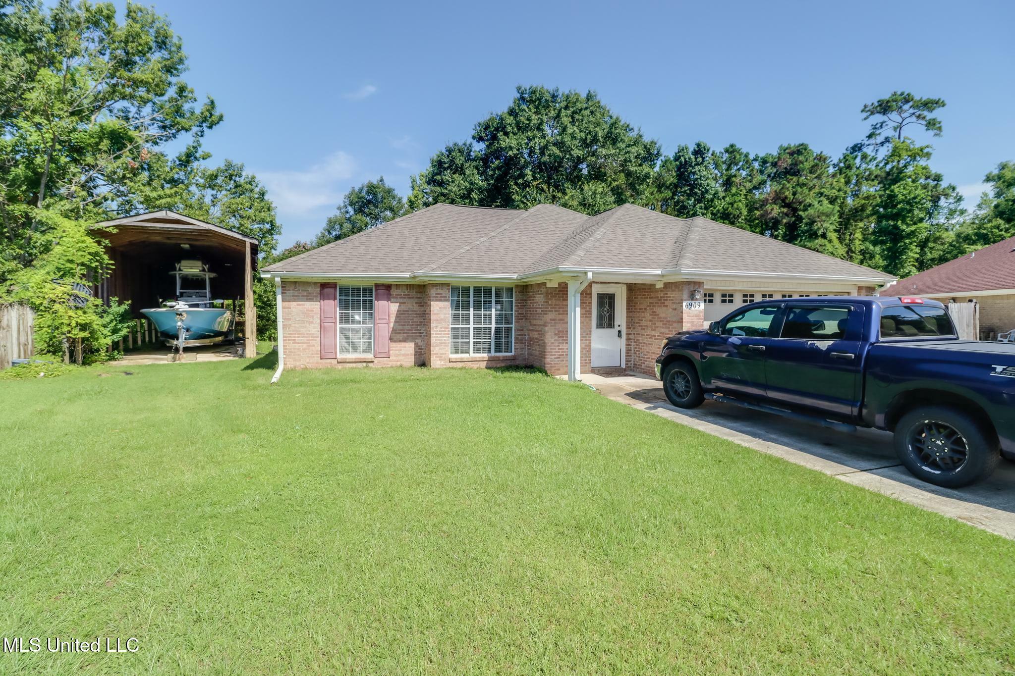 Property Photo:  6909 N Rue Mornay  MS 39532 
