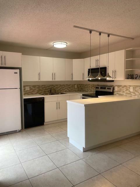 Property Photo: 3312 Spanish Wells Drive 47-A FL 33445