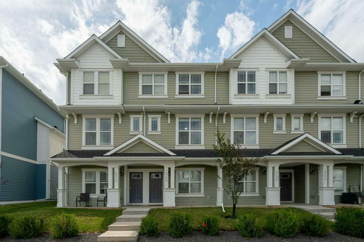 Property Photo: 240 Copperleaf Way SE AB T2Z 5G2