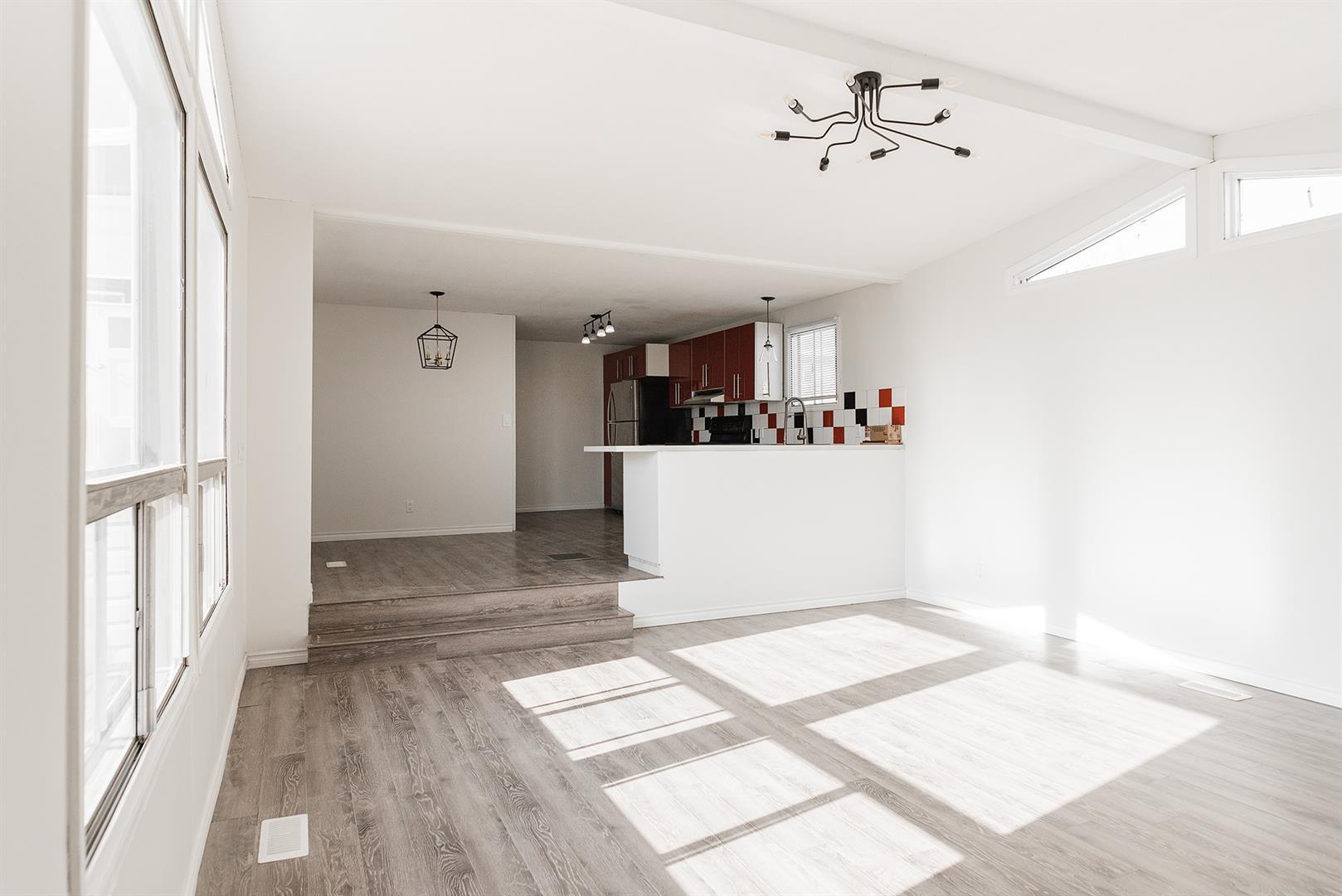 Property Photo: 232 Caouette Crescent AB T9K 2H9