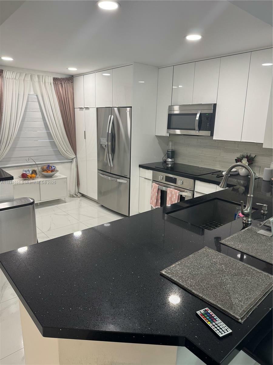 Property Photo: 13355 SW 16th Ct 105E FL 33027