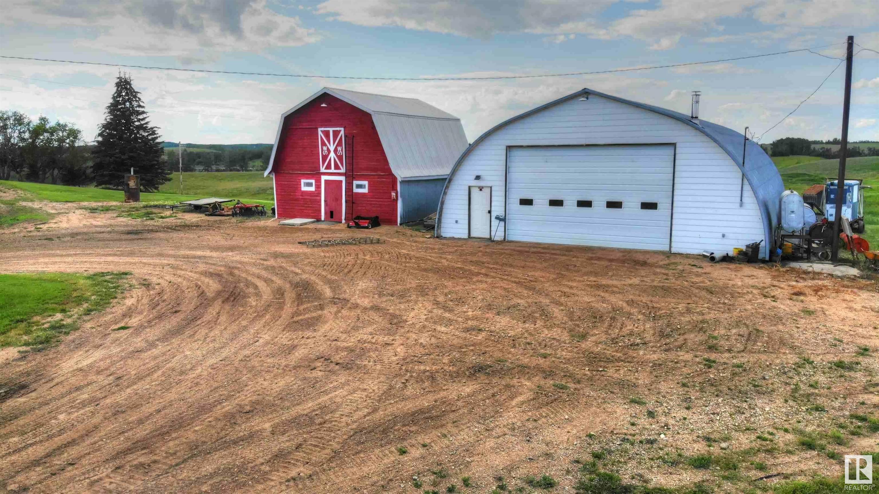Property Photo: 8318 Twp Rd 572 AB T0A 3A0