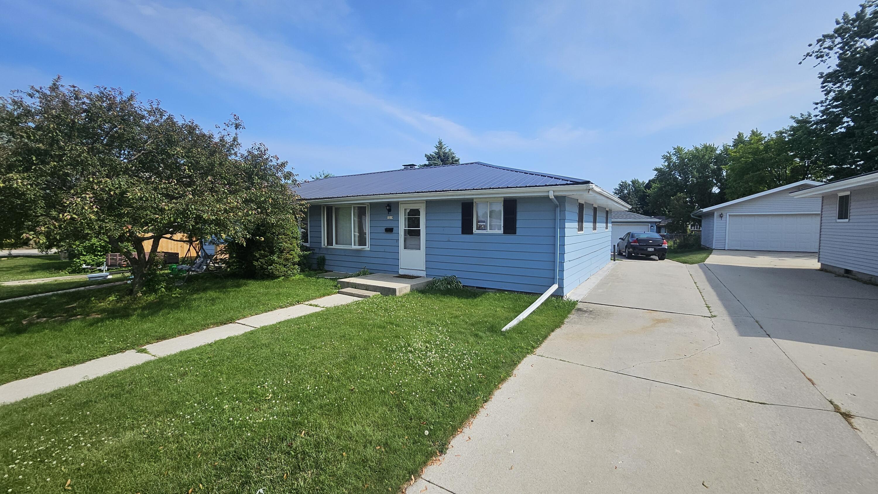 Property Photo: 1319 Greenfield Ave WI 53081