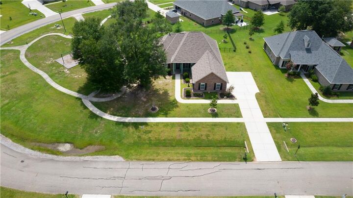 Property Photo:  318 Saw Grass Loop  LA 70435 