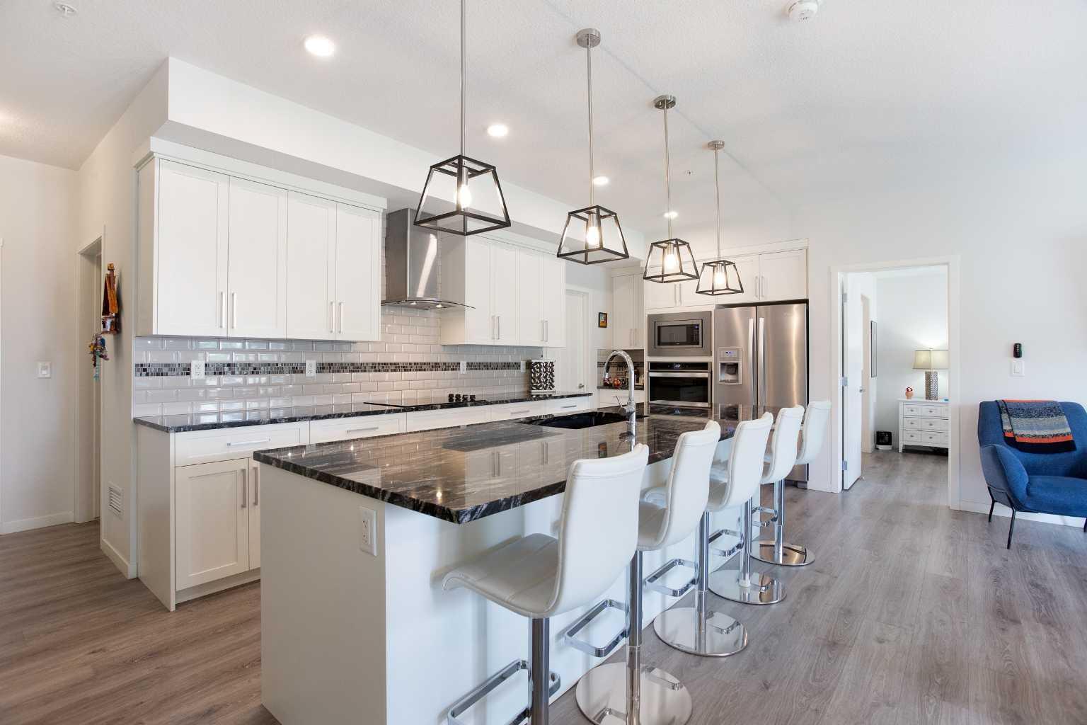 Property Photo:  4250 Seton Drive SE 110  AB T3M 3B7 