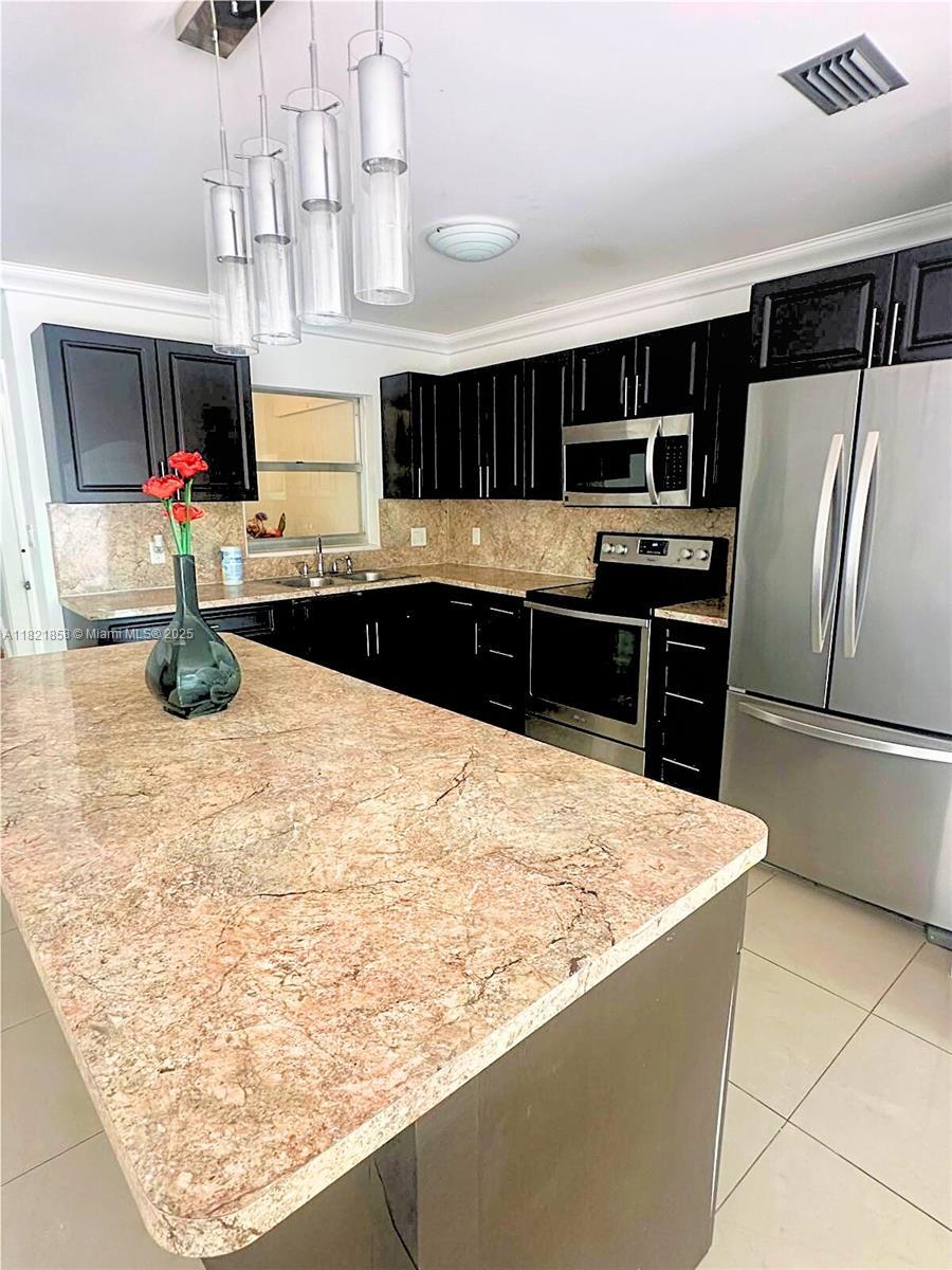 Property Photo: 7327 Pepper Pike Dr FL 33015