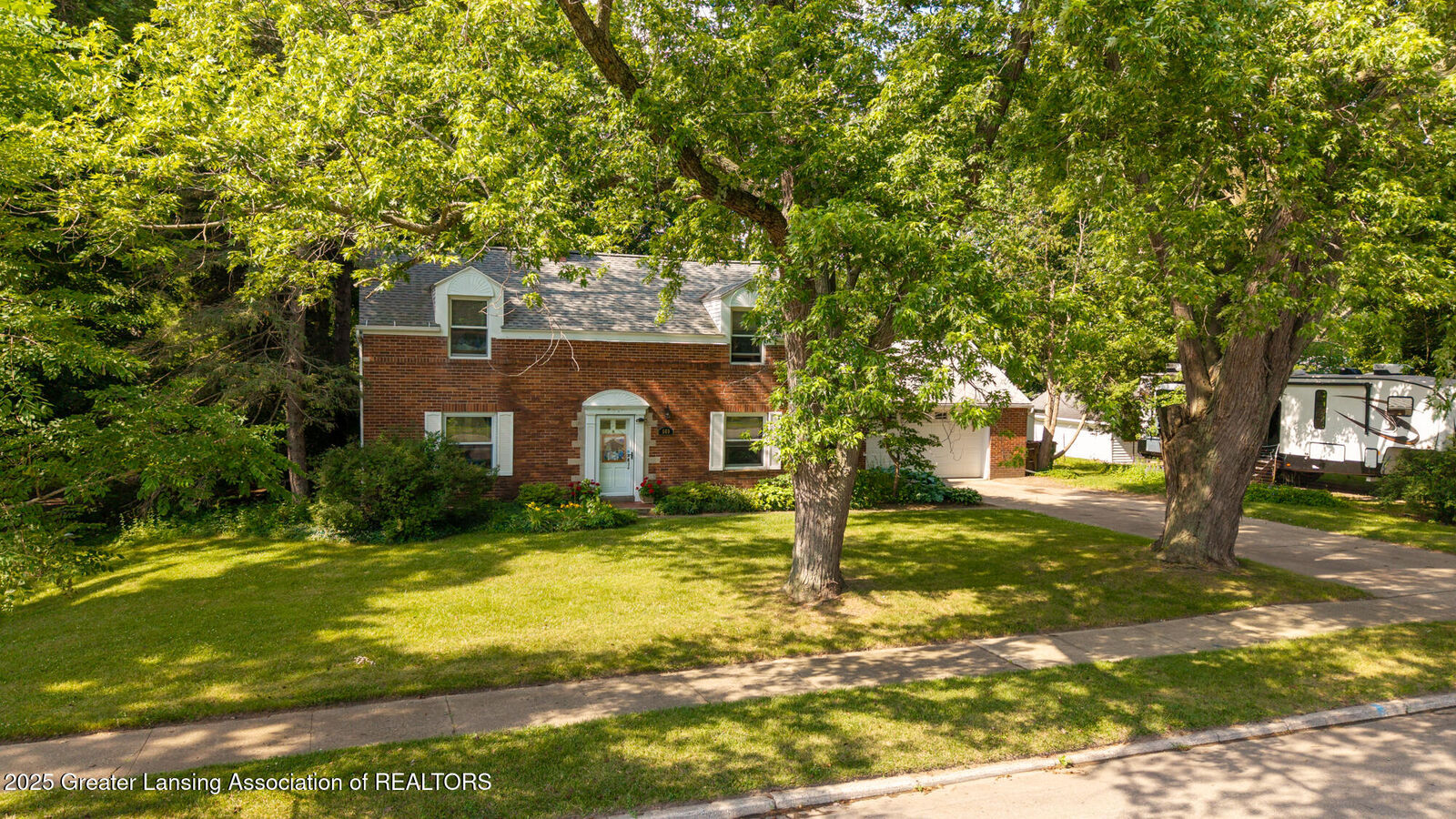 Property Photo:  569 E Holmes Road  MI 48910 