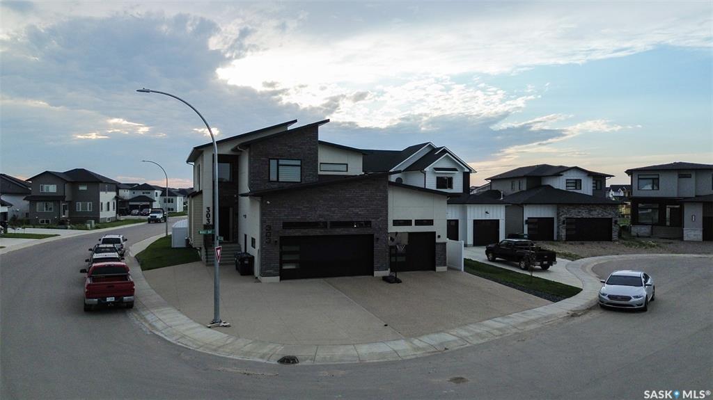 Property Photo: 303 Woolf Bay SK S7W 1E5