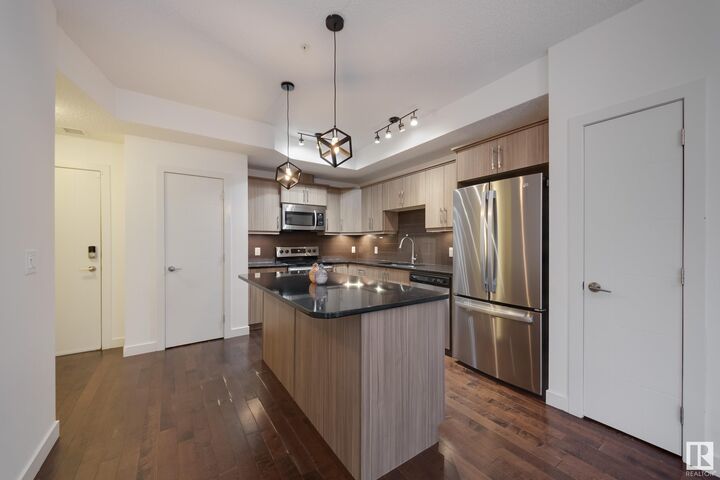 Property Photo:  10523 123 Street NW 115  AB T5N 1N9 