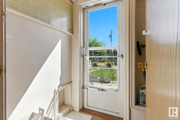 Property Photo:  11033 107 Street NW  AB T5H 2Z6 
