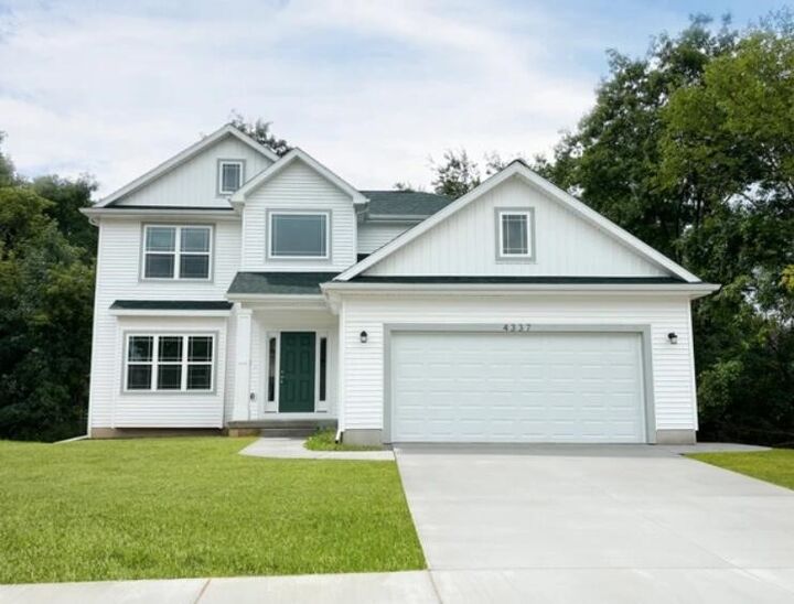 Property Photo: 563 W Wildwood Drive MI 48867-9119