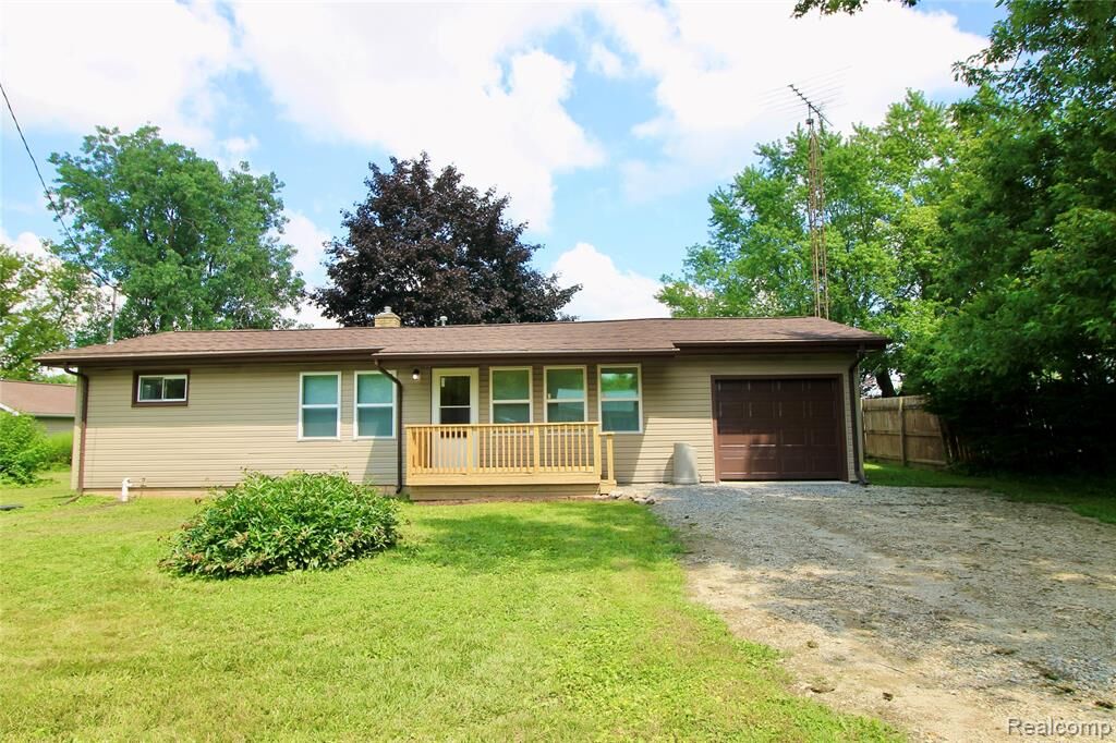 Property Photo:  9116 Maplewood Drive  MI 48420 9764 