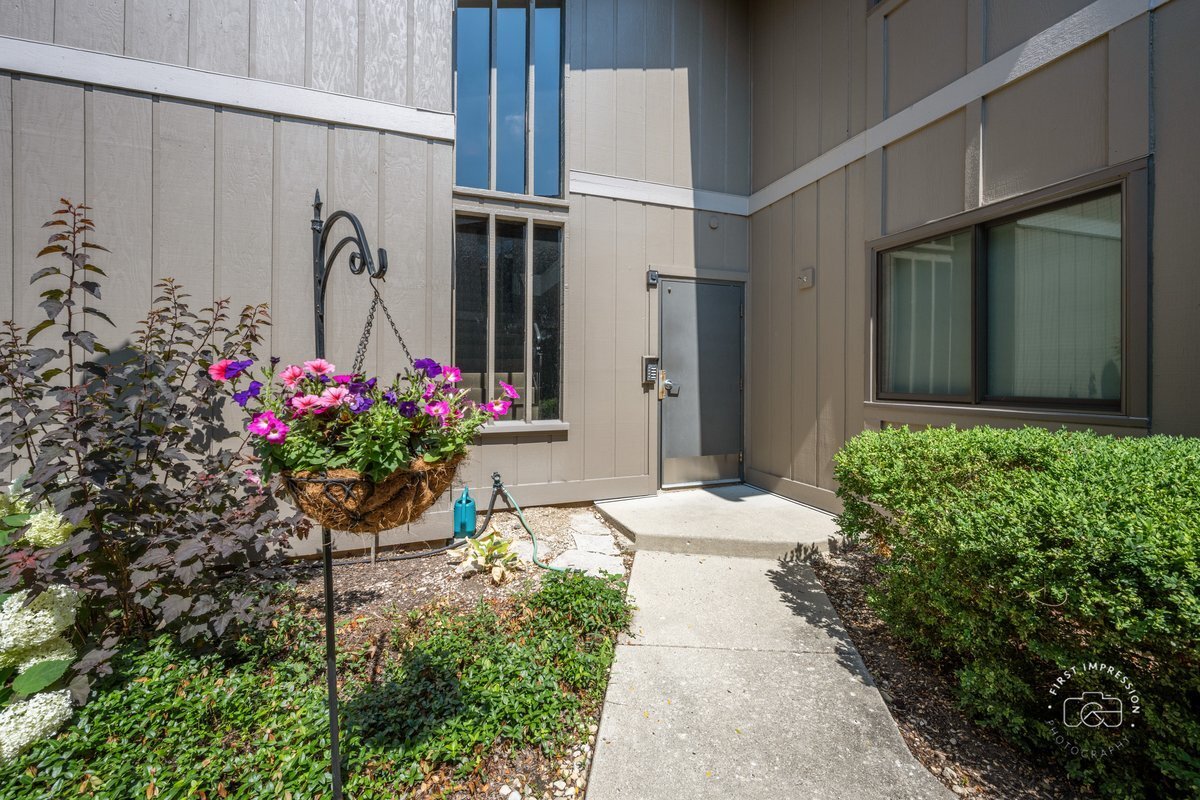Property Photo: 29W440 Emerald Green Drive 25-F IL 60555