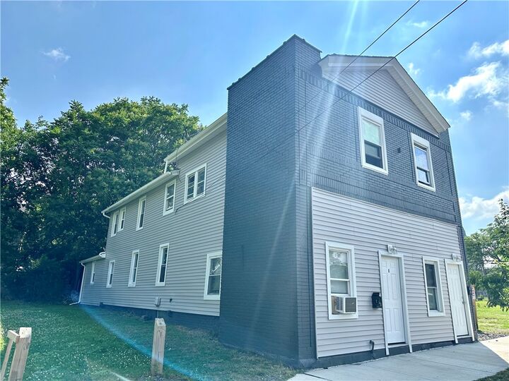 Property Photo: 50 Saratoga Avenue NY 14608
