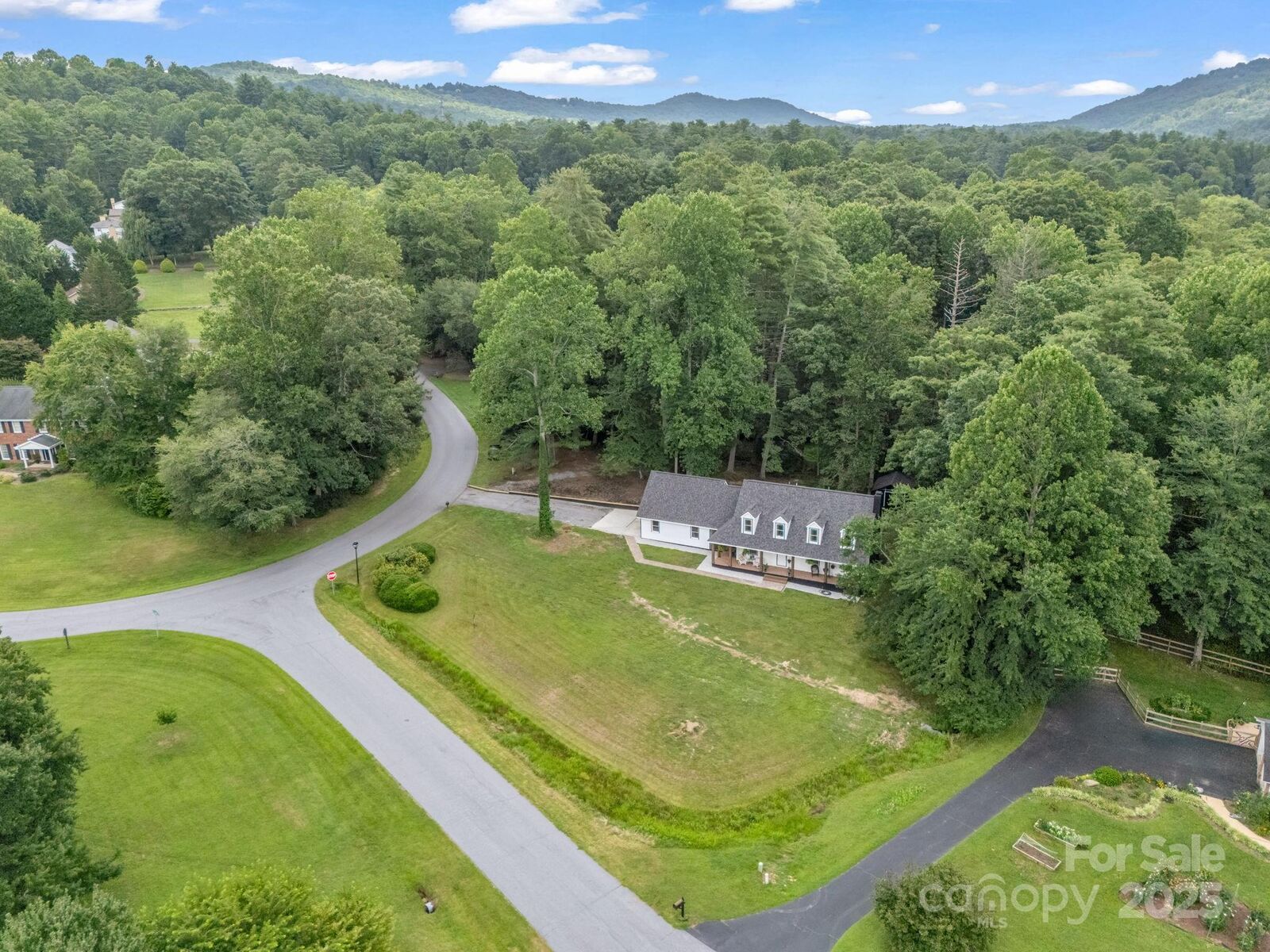 Property Photo:  213 Raintree Drive  NC 28791 