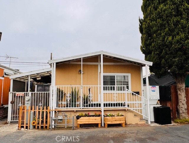 Property Photo: 15325 Orange Ave, D8 CA 90723