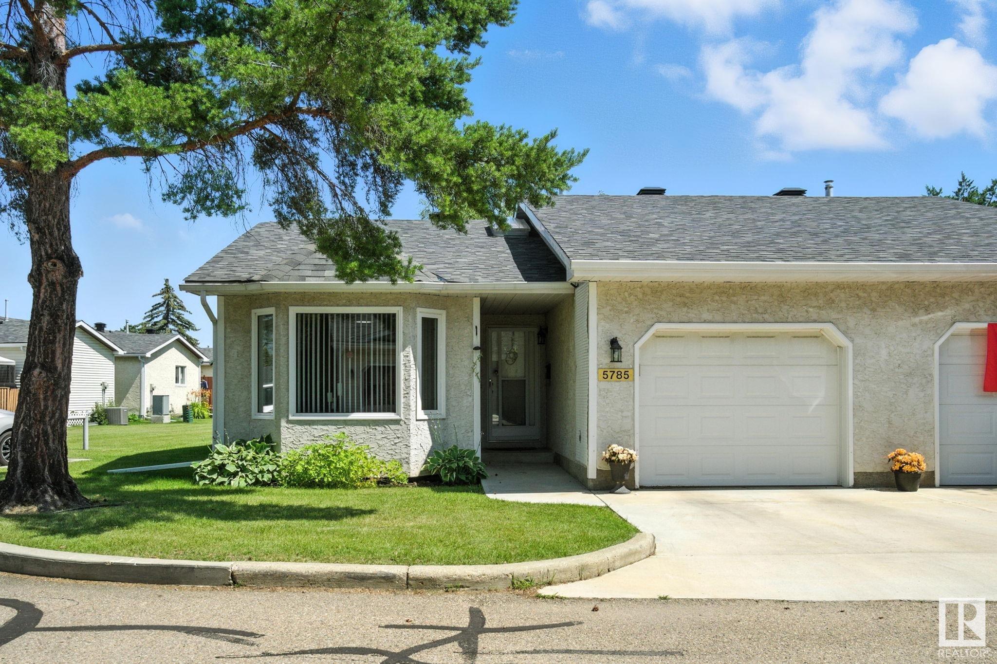Property Photo: 5785 189 Street NW AB T6M 2G9