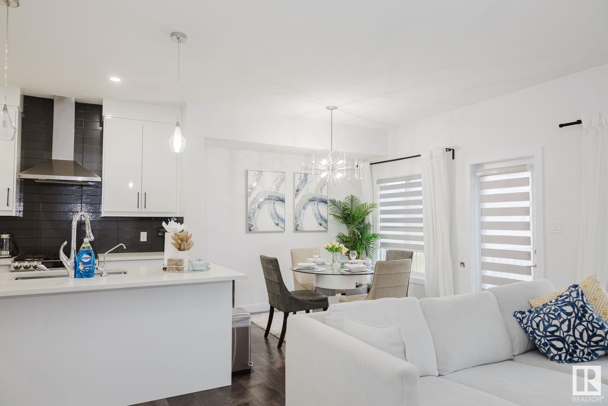 Property Photo: 7209 Chivers Place SW AB T6W 4L4