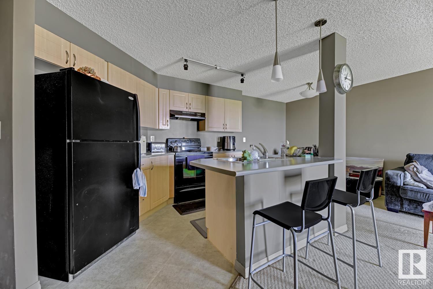 Property Photo:  11441 Ellerslie Road SW 308  AB T6W 1S9 