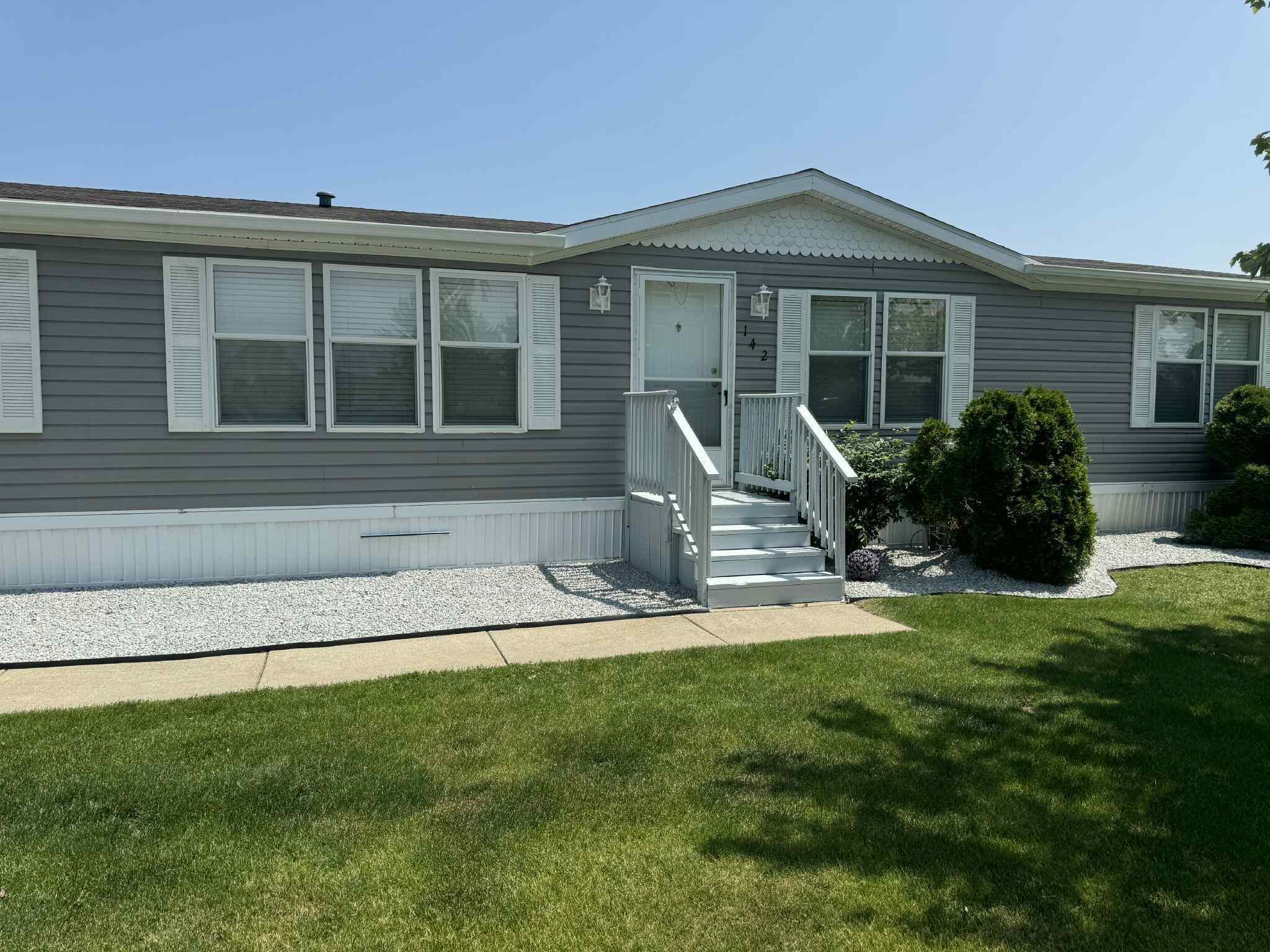 Property Photo: 7204 E Grand River Ave MI 48875