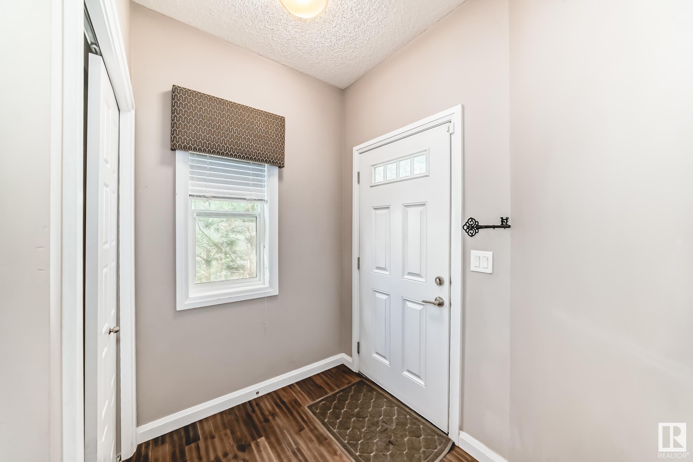 Property Photo: 3710 Allan Drive SW 1 AB T5H 3V9