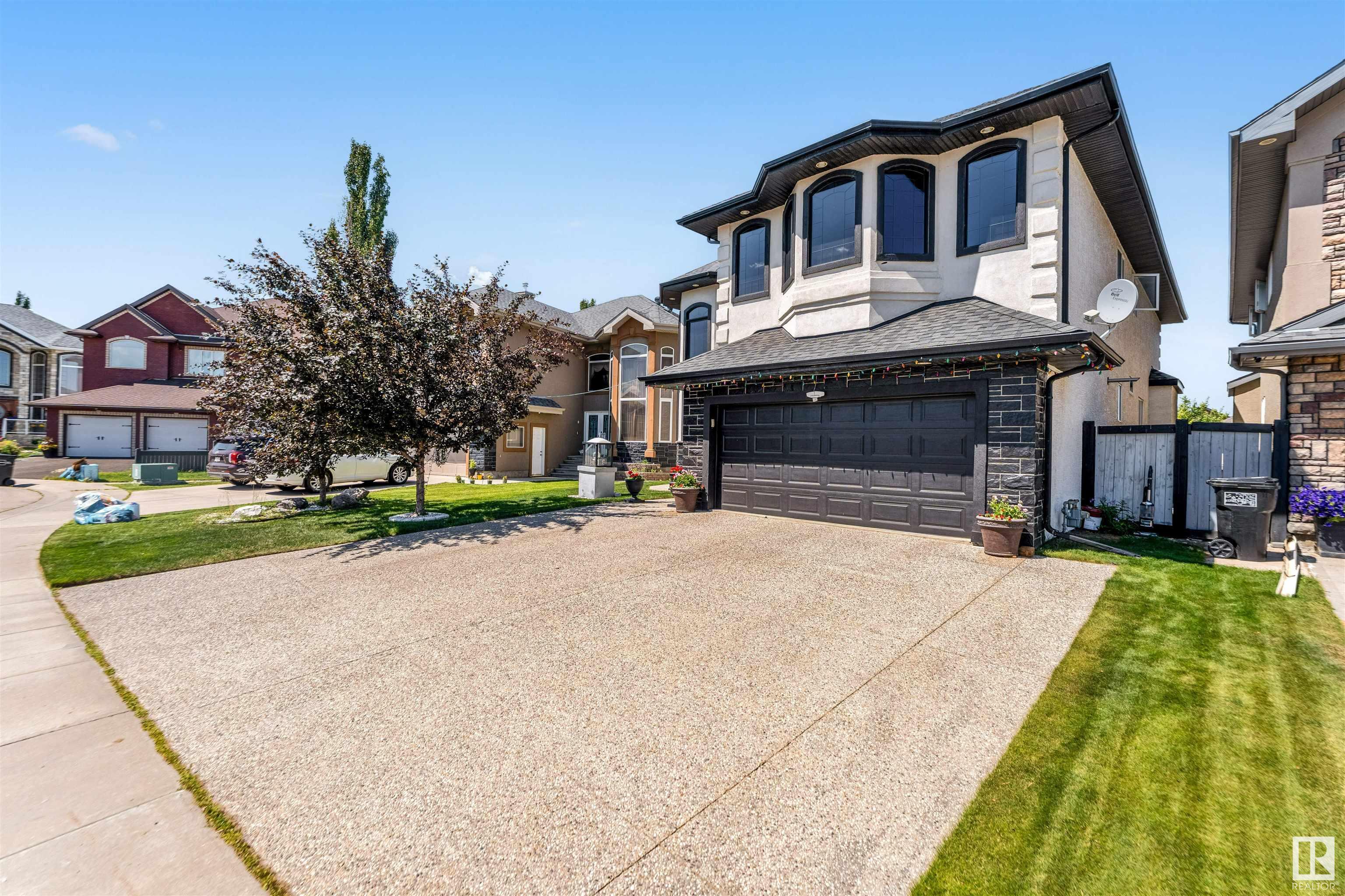 Property Photo:  6928 14 Avenue SW  AB T6L 1L3 