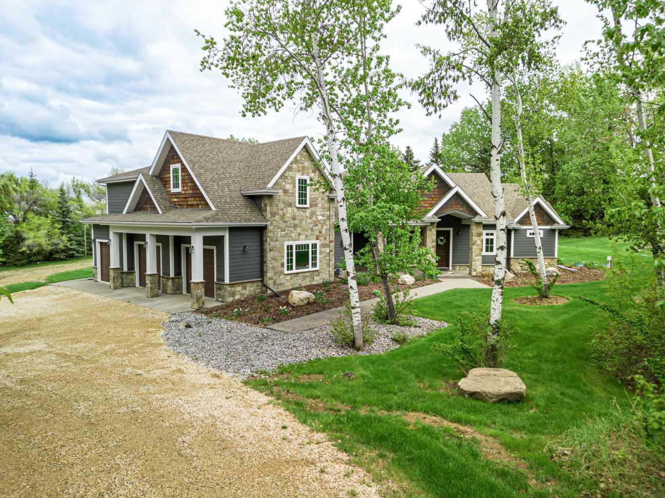 Property Photo:  38349 Range Road 270 14  AB T4E 1A2 