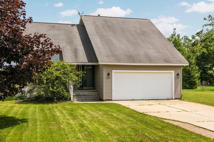 Property Photo:  2654 Hickorywood Drive  MI 49735 