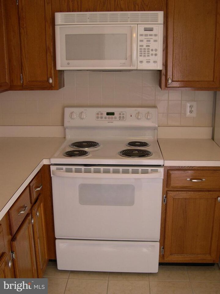 Property Photo:  3024 Gentain Court NE 3024  DC 20017 