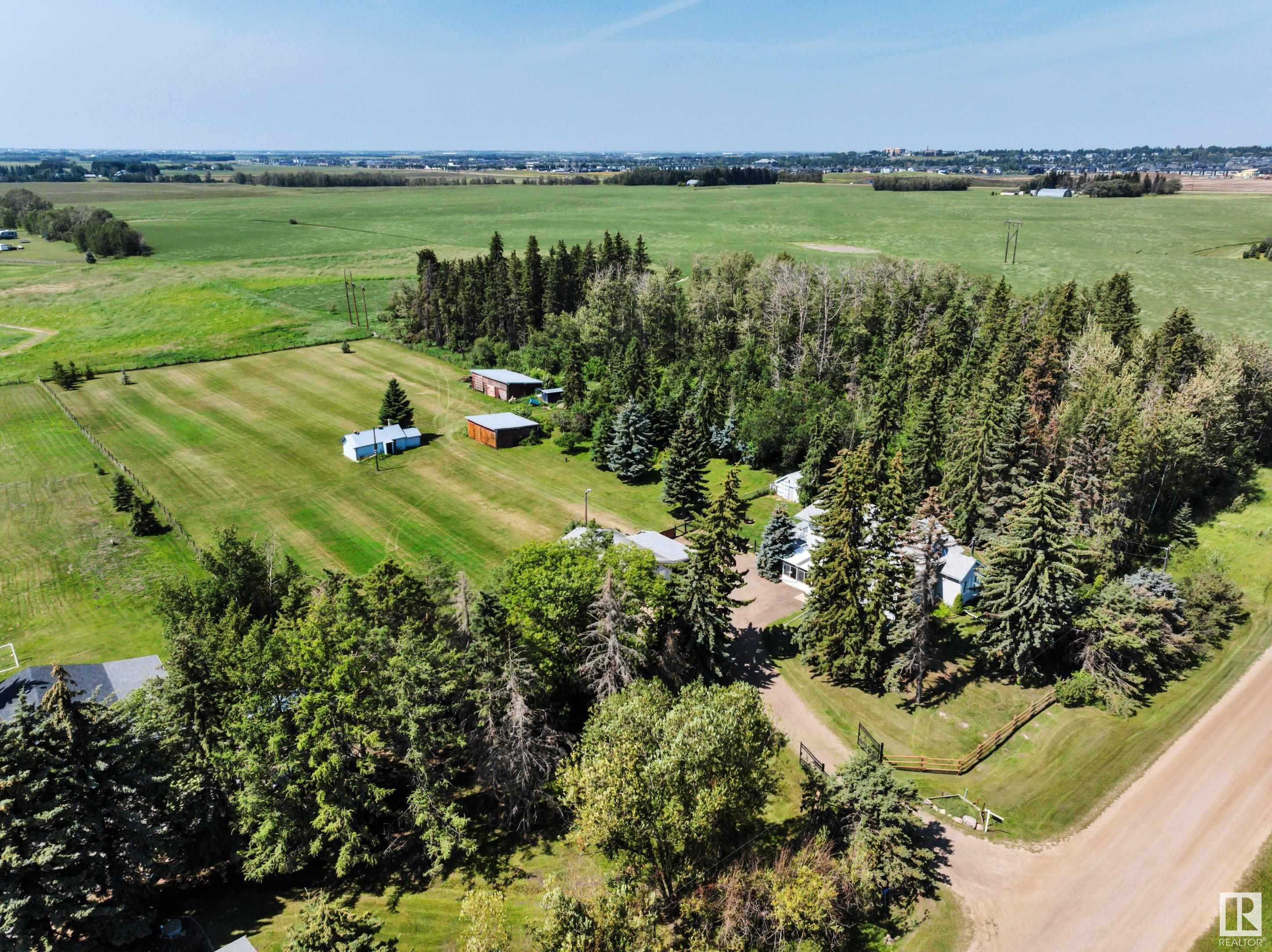 Property Photo: 50340 Rge Road 241 AB T4X 0M9