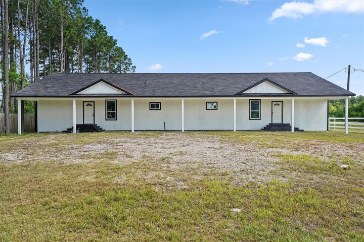 Property Photo:  711 Road 5014  TX 77327 